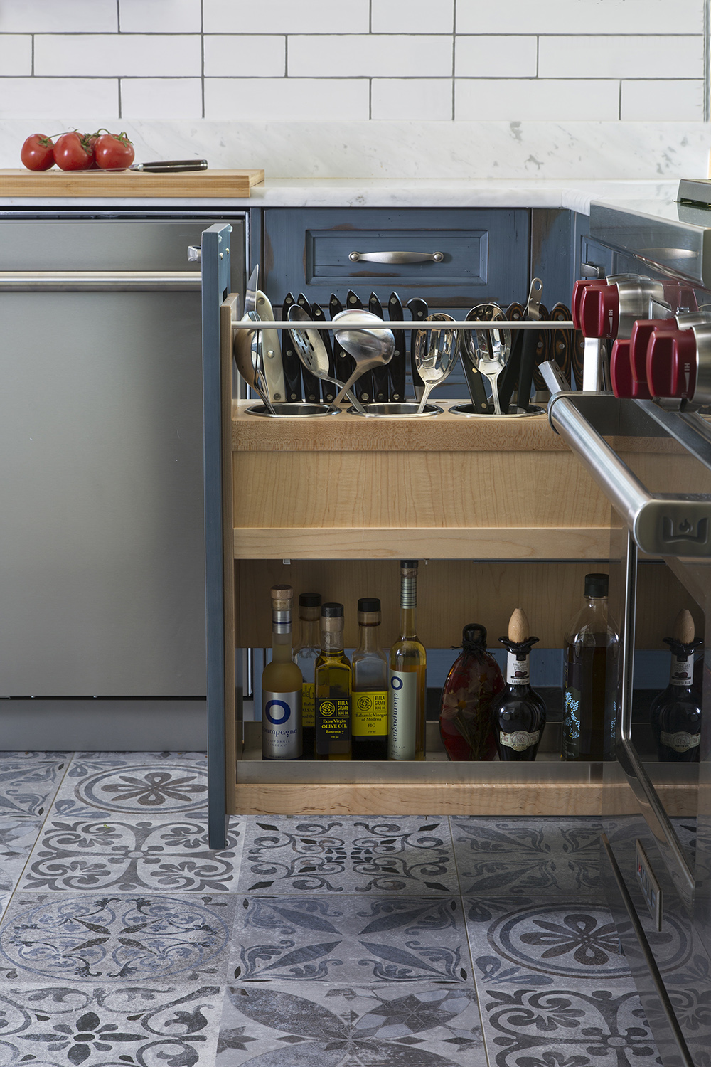 Custom-made cabinets for spice rack in luxury kitchen by William Ohs in Denver