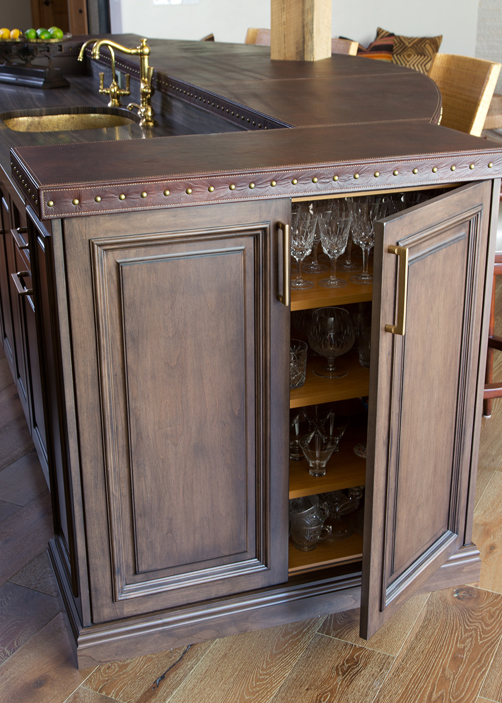 Custom built cabinets in Mahogany for kitchen island by William Ohs in Denver