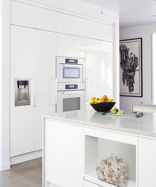 Luxury modern kitchen design in all white by William Ohs in Denver