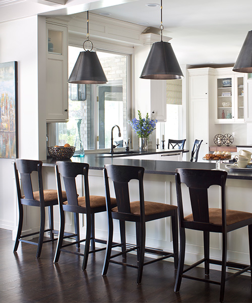 Matte black and white luxury kitchen remodel by William Ohs in Denver