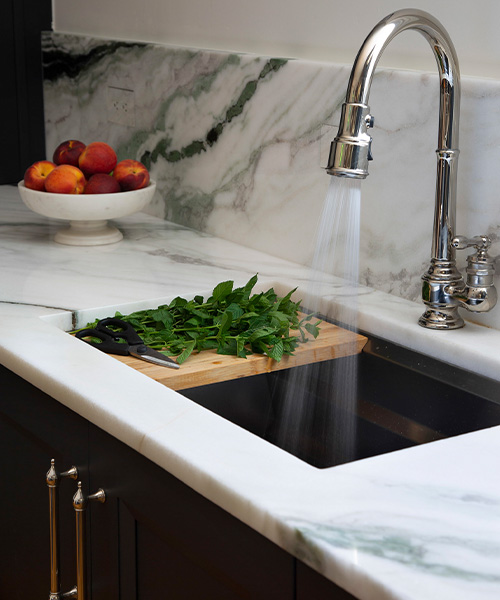 Dark cabinets with marble countertop