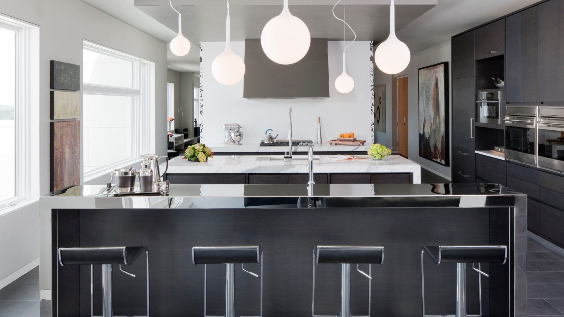 grey kitchen with lights overtop