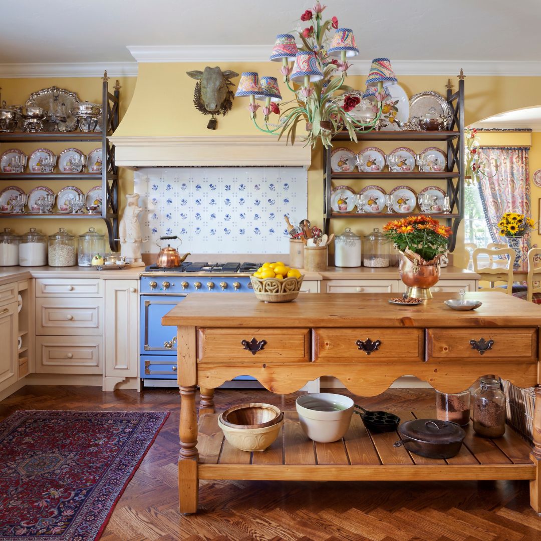 custom kitchen cabinets with a wooden island in the middle