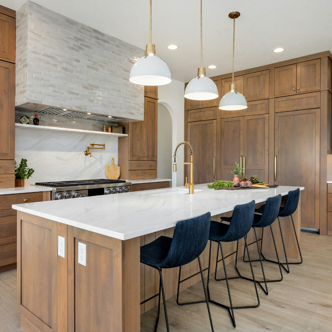 A kitchen with wood cabinets